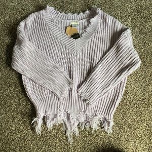 Distressed sweater